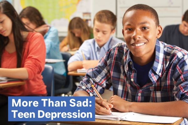 Smiling teen in classroom; text on depression.